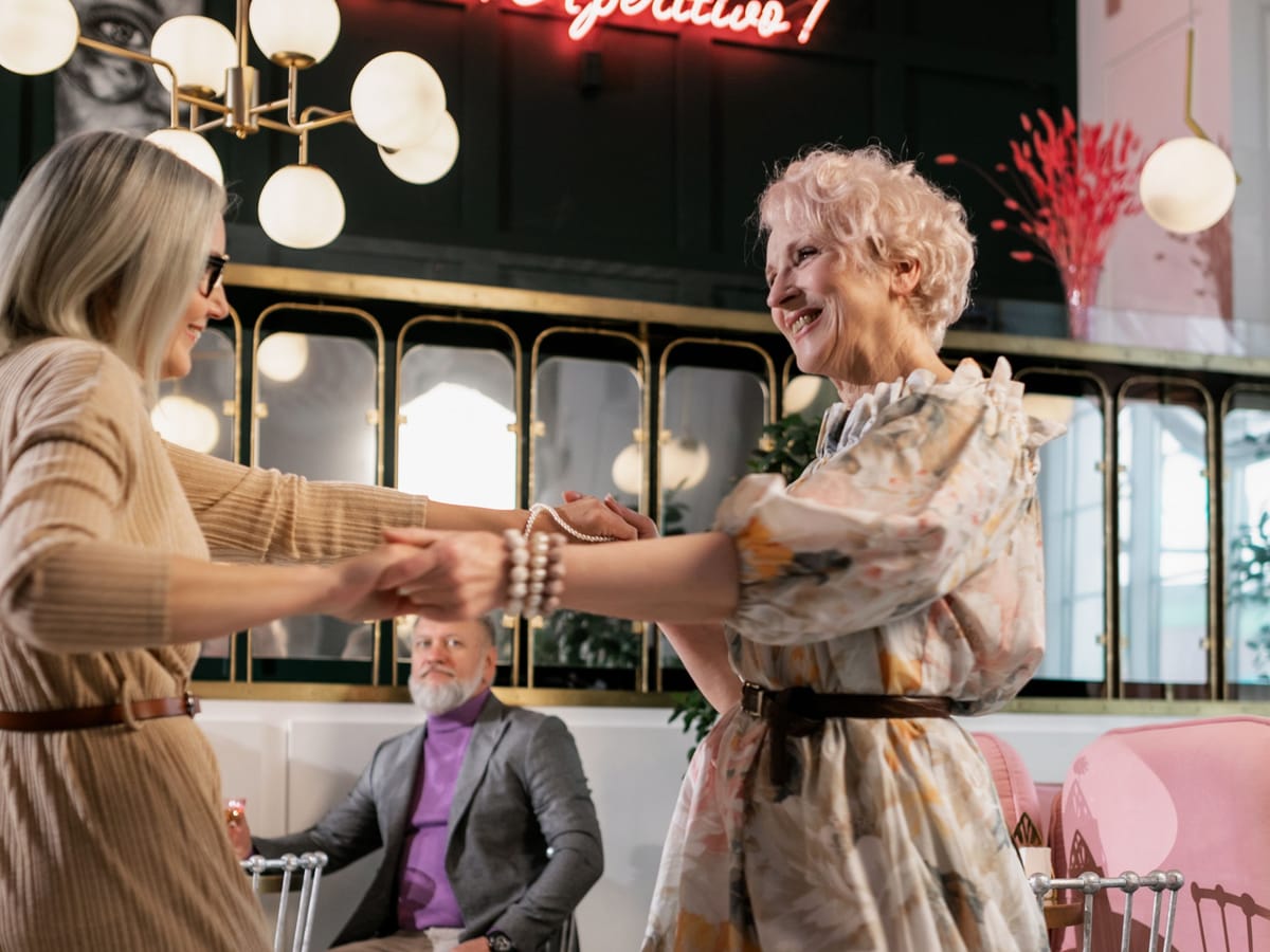 Residents dancing together at a community social
